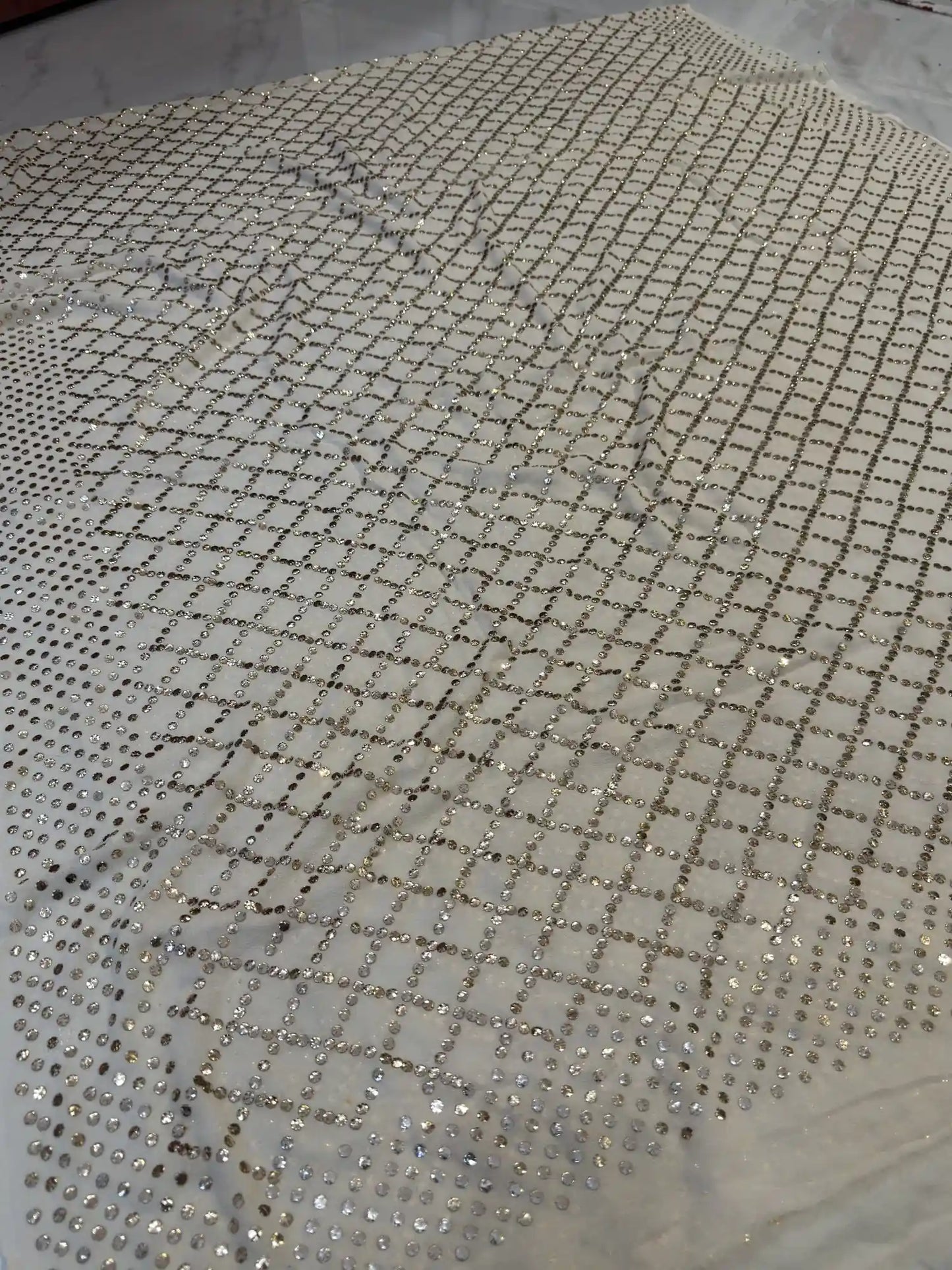 Side view of Checks Lucknowi Chikankari Dupatta featuring handcrafted geometric embroidery.