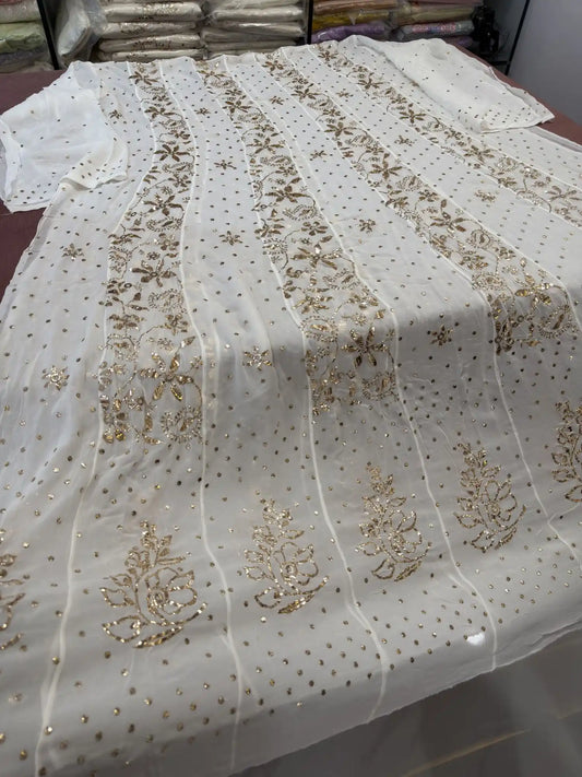 Back view of handcrafted Lucknowi Chikankari Georgette Anarkali with heavy gold Mukaish work