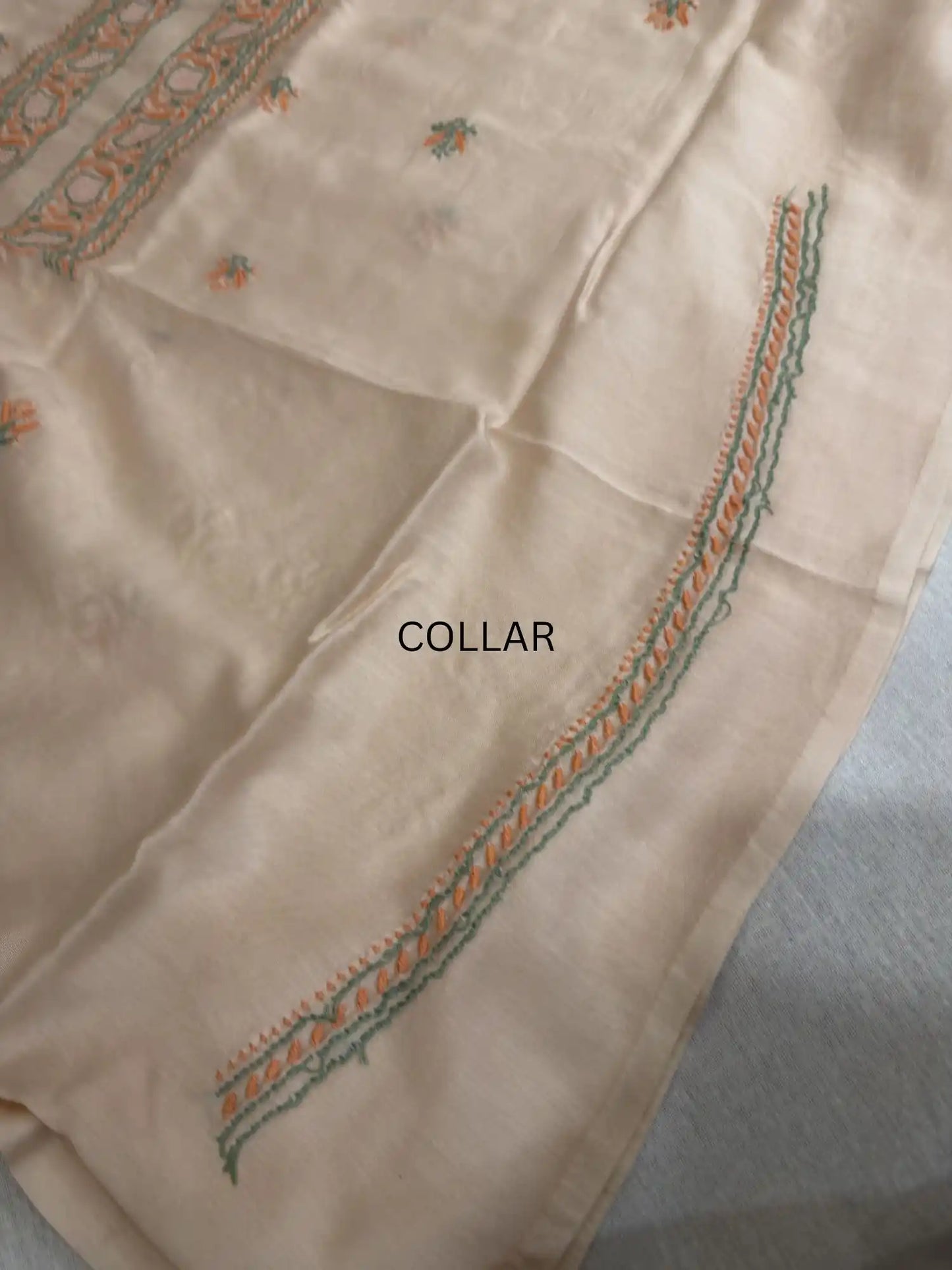 Handcrafted Lucknowi Chikankari collar embroidery on premium Peach Blush Chanderi Silk unstitched kurta fabric.