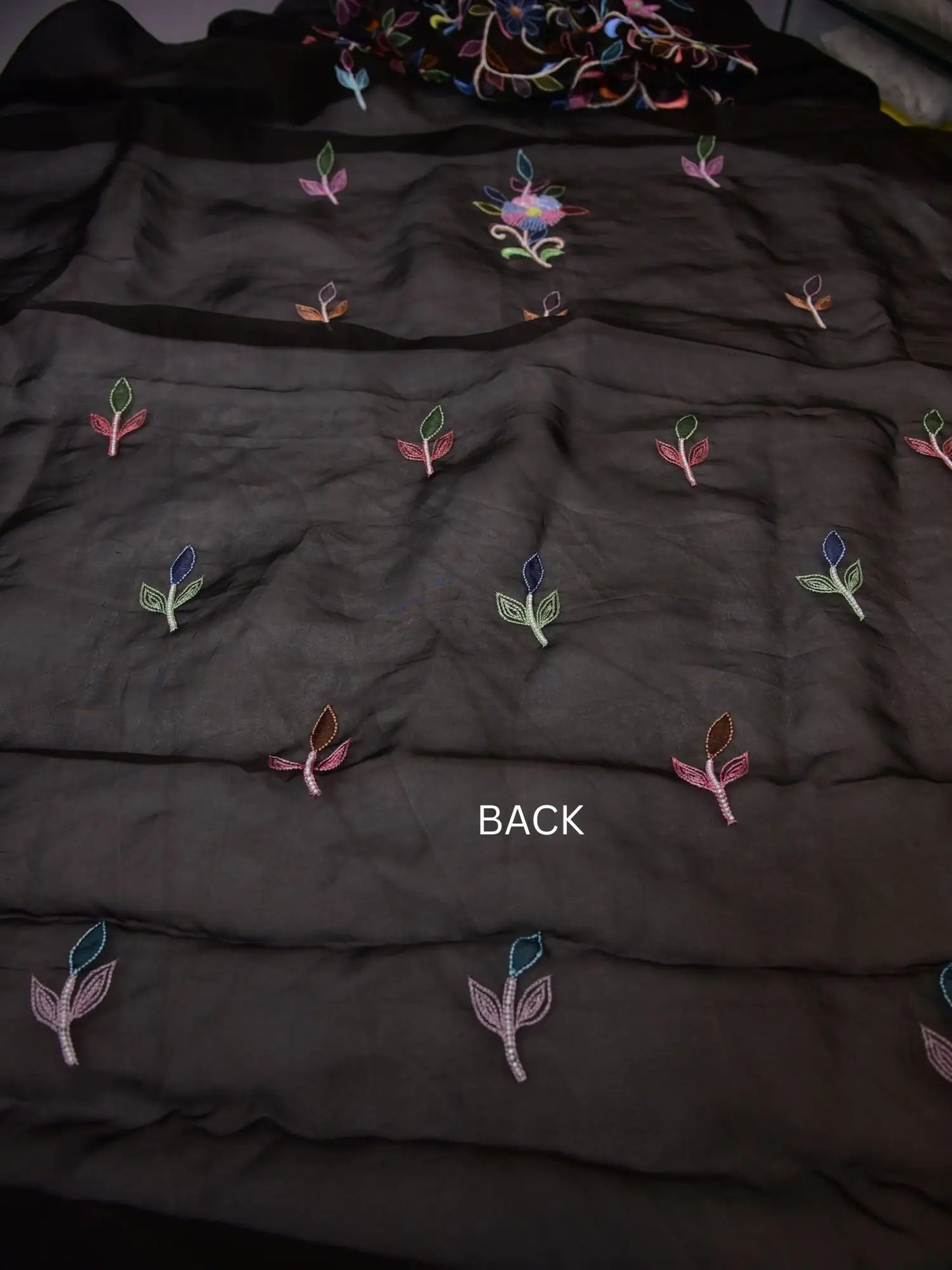 Back view of black Pure Organza Silk straight suit with multicolour floral motifs
