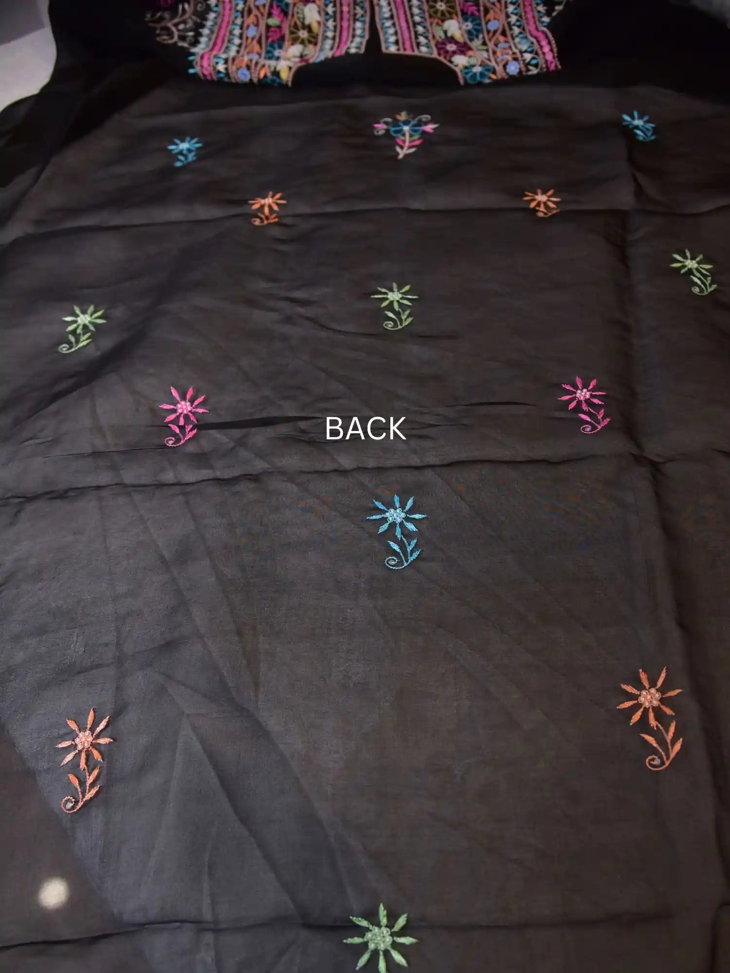 Back view of black Pure Organza Silk straight suit with multicolour floral embroidery