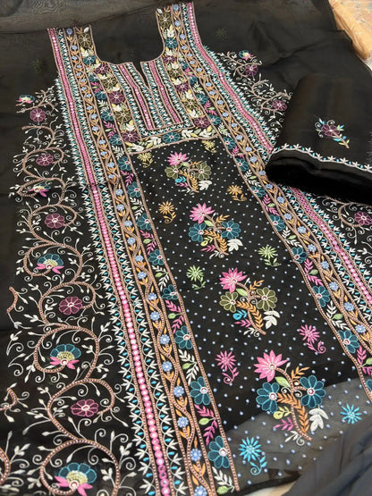 Side view of black Pure Organza Silk straight suit with full sleeves and floral embroidery