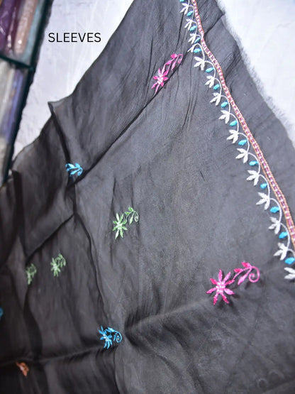 Full sleeve detail of black Pure Organza Silk suit with multicolour floral Parsi Shadow embroidery