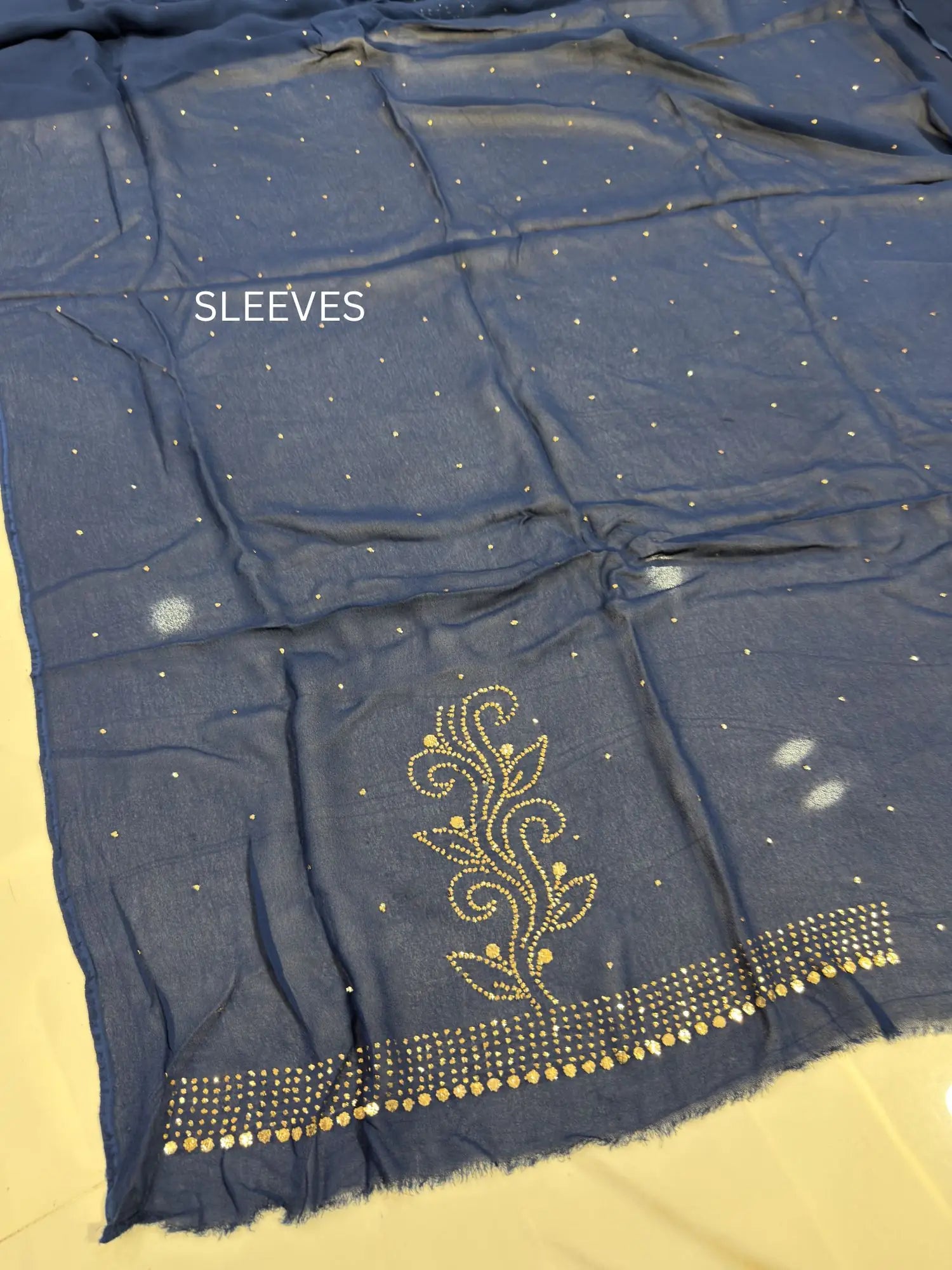 Sleeve detail featuring handcrafted Mukaish work on a Blue Lucknowi Kurta