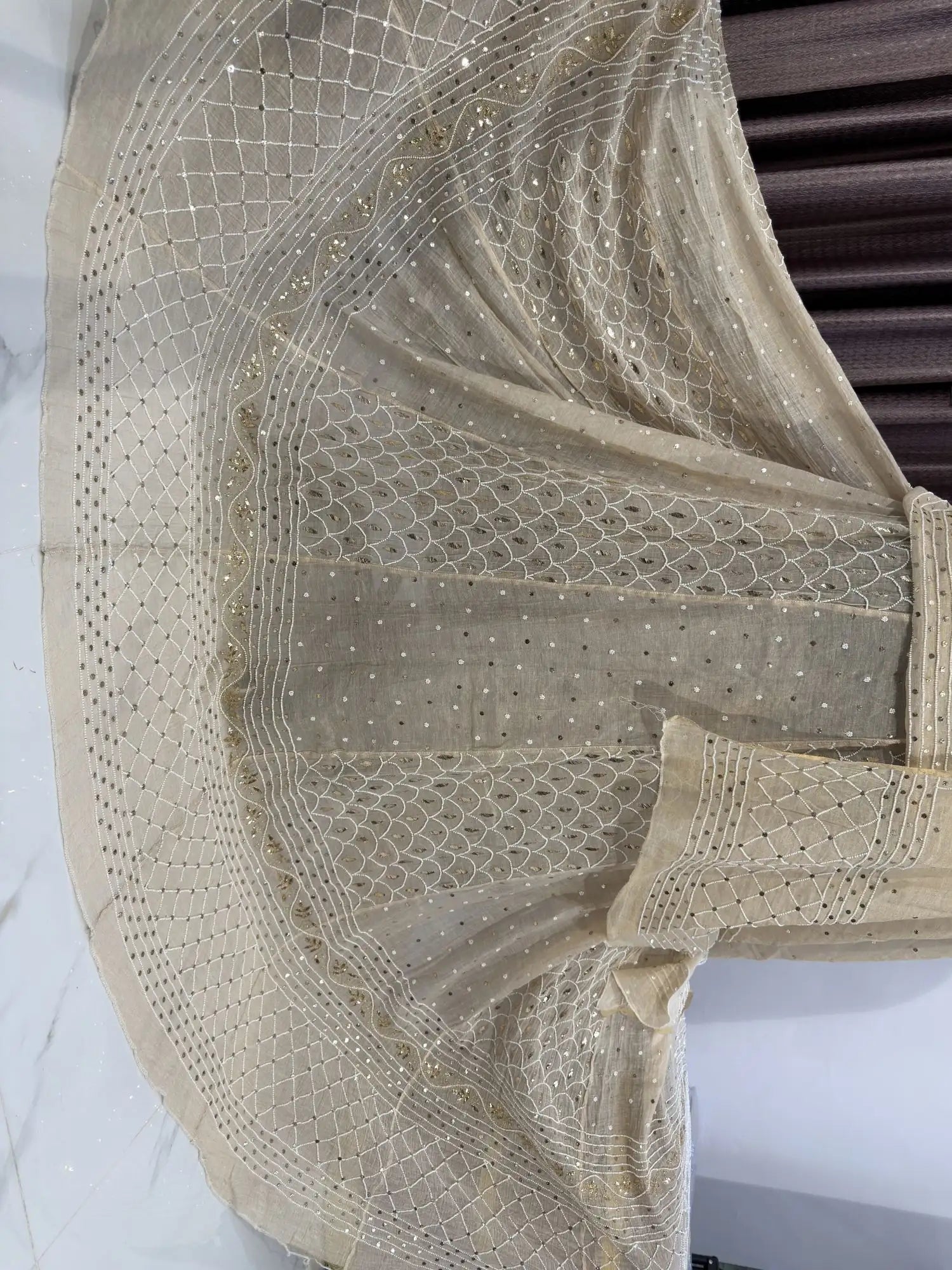 Front view of Checks Lucknowi Chikankari Lehenga with elegant geometric embroidery.