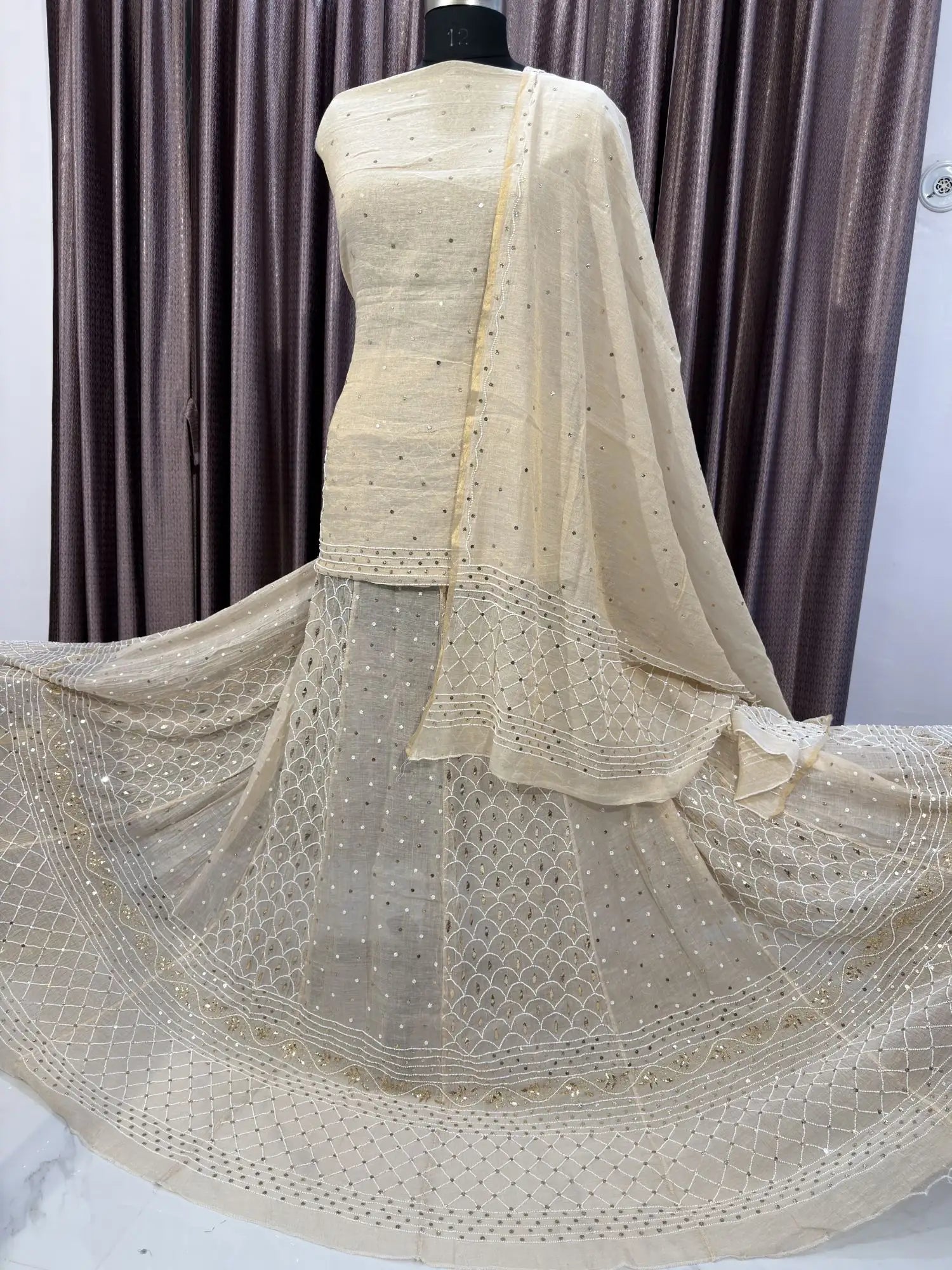 Side view of Checks Lucknowi Chikankari Lehenga showcasing handcrafted check-pattern embroidery.