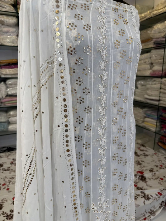 Close-up of gold-toned Badla, Pearl and Mukaish handwork on Chikankari Anarkali
