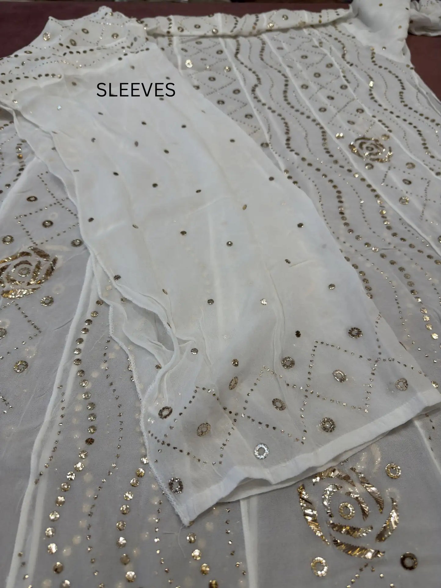 Designer dyeable sleeves with handcrafted gold-toned Mukaish work