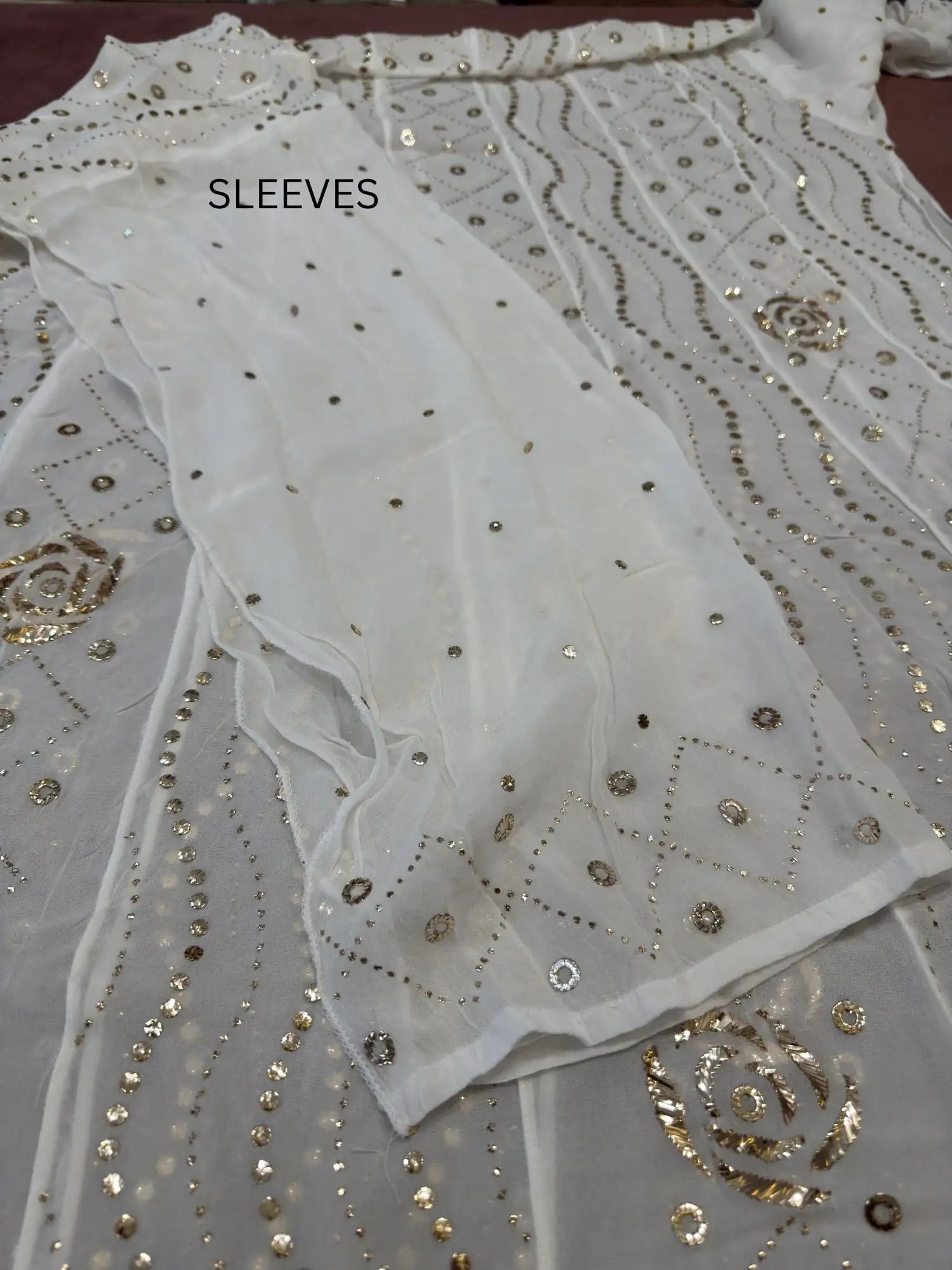 Designer dyeable sleeves with handcrafted gold-toned Mukaish work