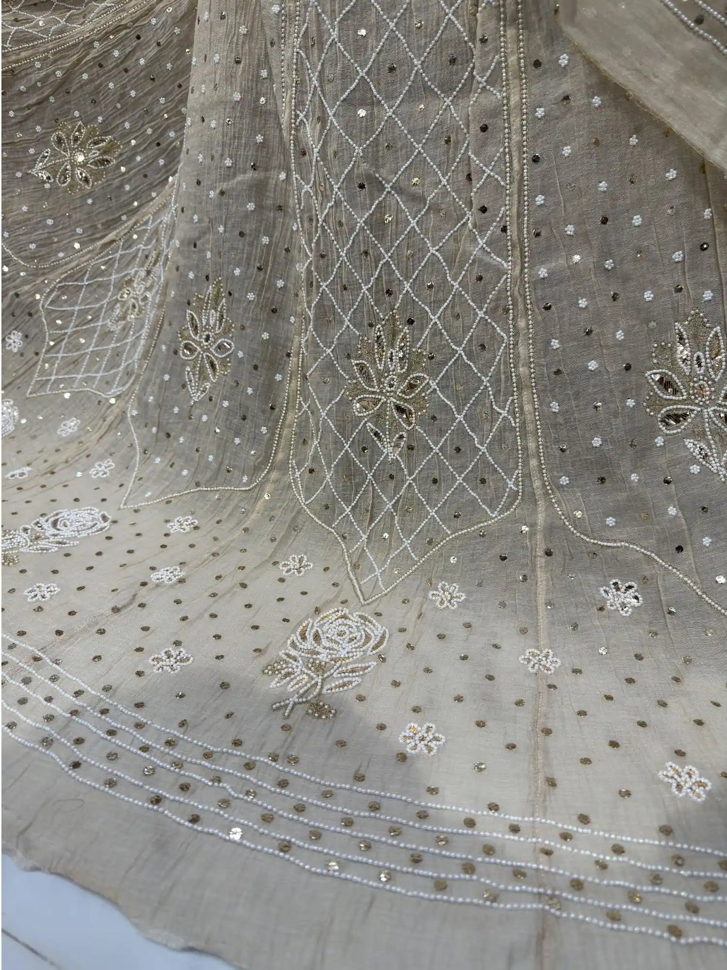 Diamond jaal embroidery with handcrafted pearl and Mukaish work on a luxury Lucknowi lehenga