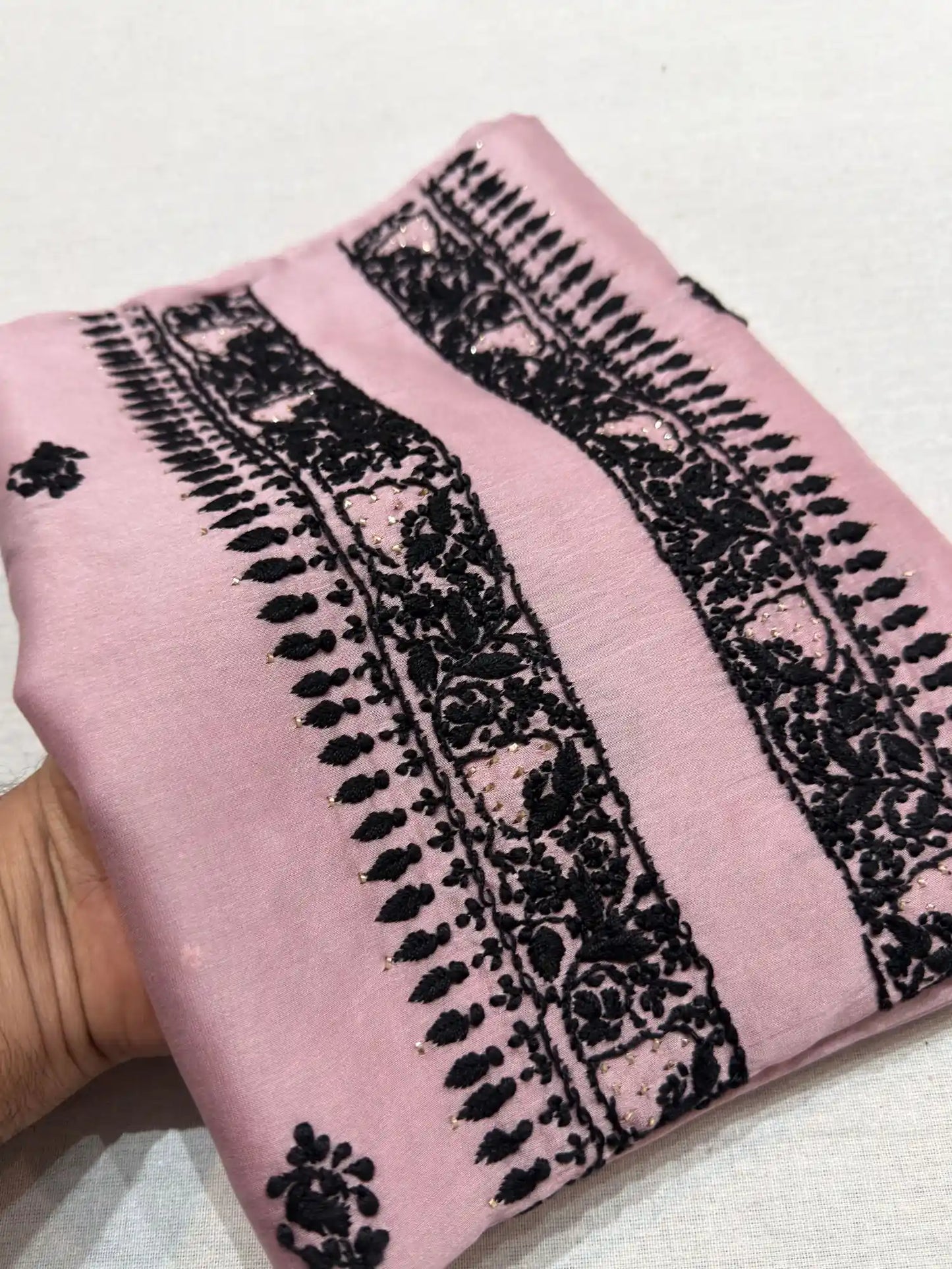 Front detail of Dusty Mauve linen Chikankari unstitched kurta fabric with fine embroidery.
