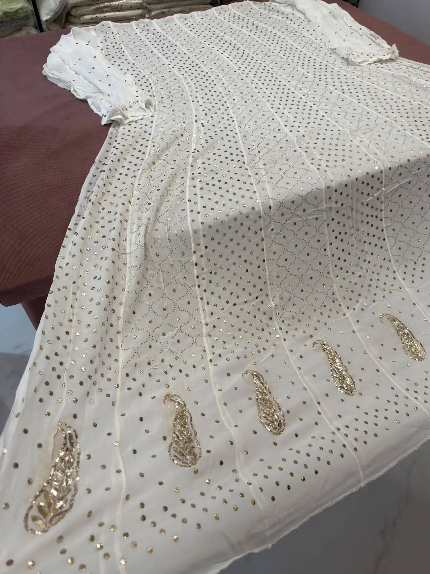 Close up of dyeable Lucknowi Chikankari Anarkali with handcrafted Mukaish embroidery of leaf