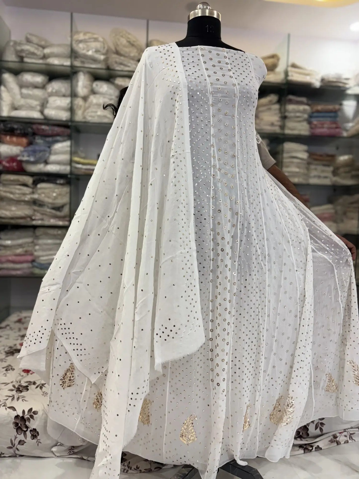 Front view of dyeable Lucknowi Chikankari Viscose Georgette Anarkali with circular gold-toned Mukaish work