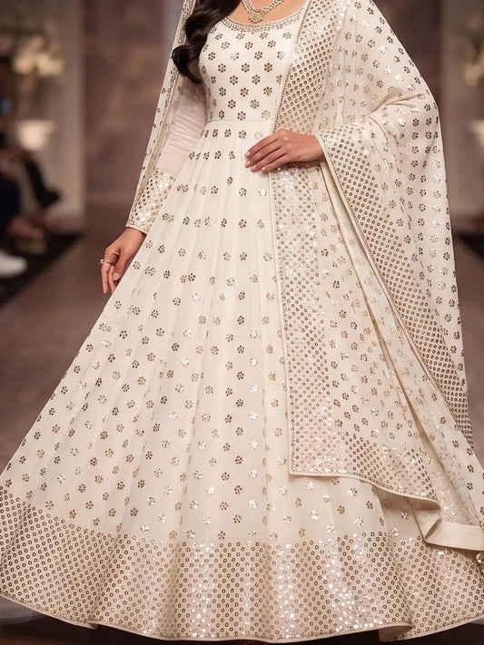 Model wearing a white floral Lucknowi Mukaish dupatta in Pure Georgette with handcrafted Kamdani work