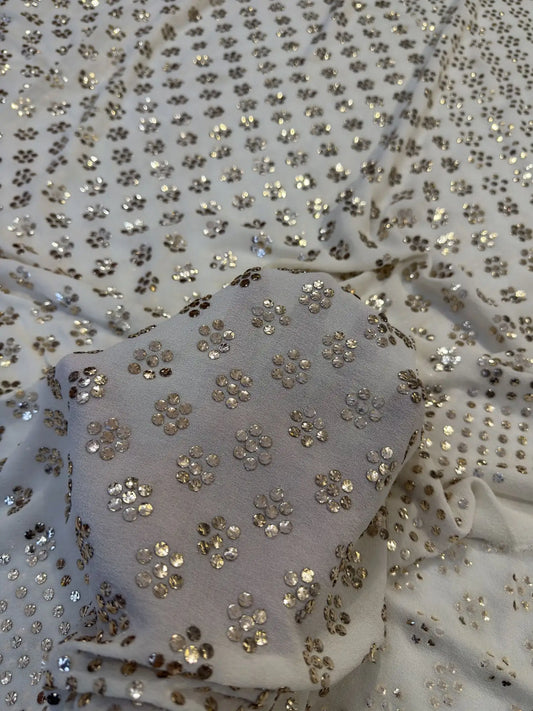 Close-up of handcrafted floral Mukaish and Badla work on a white Pure Georgette dupatta