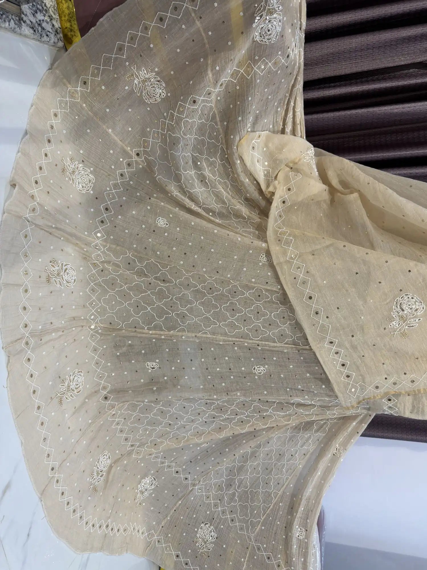 Close-up of the floral rose Chikankari embroidery on the Lucknowi Lehenga.