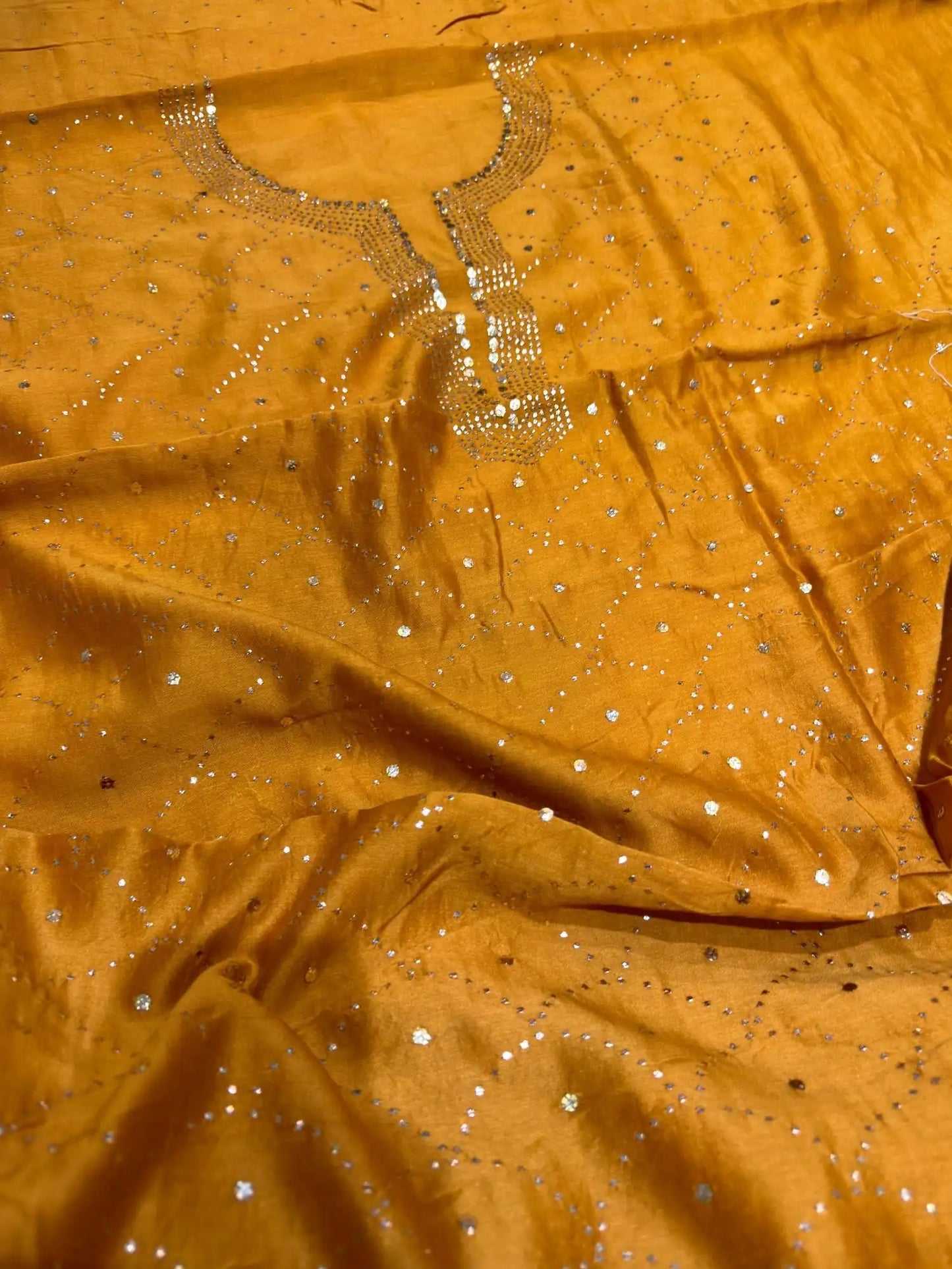 Close-up of Mukaish work on Golden Mustard Chanderi Silk suit