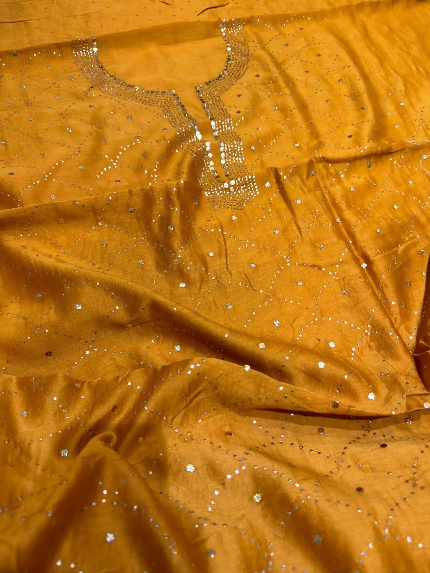 Close-up of Mukaish work on Golden Mustard Chanderi Silk suit