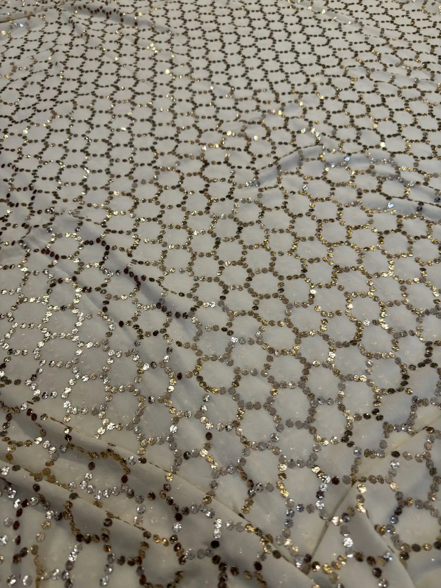 Close-up view of the intricate honeycomb Chikankari embroidery on the Honeycomb Lucknowi Dupatta.