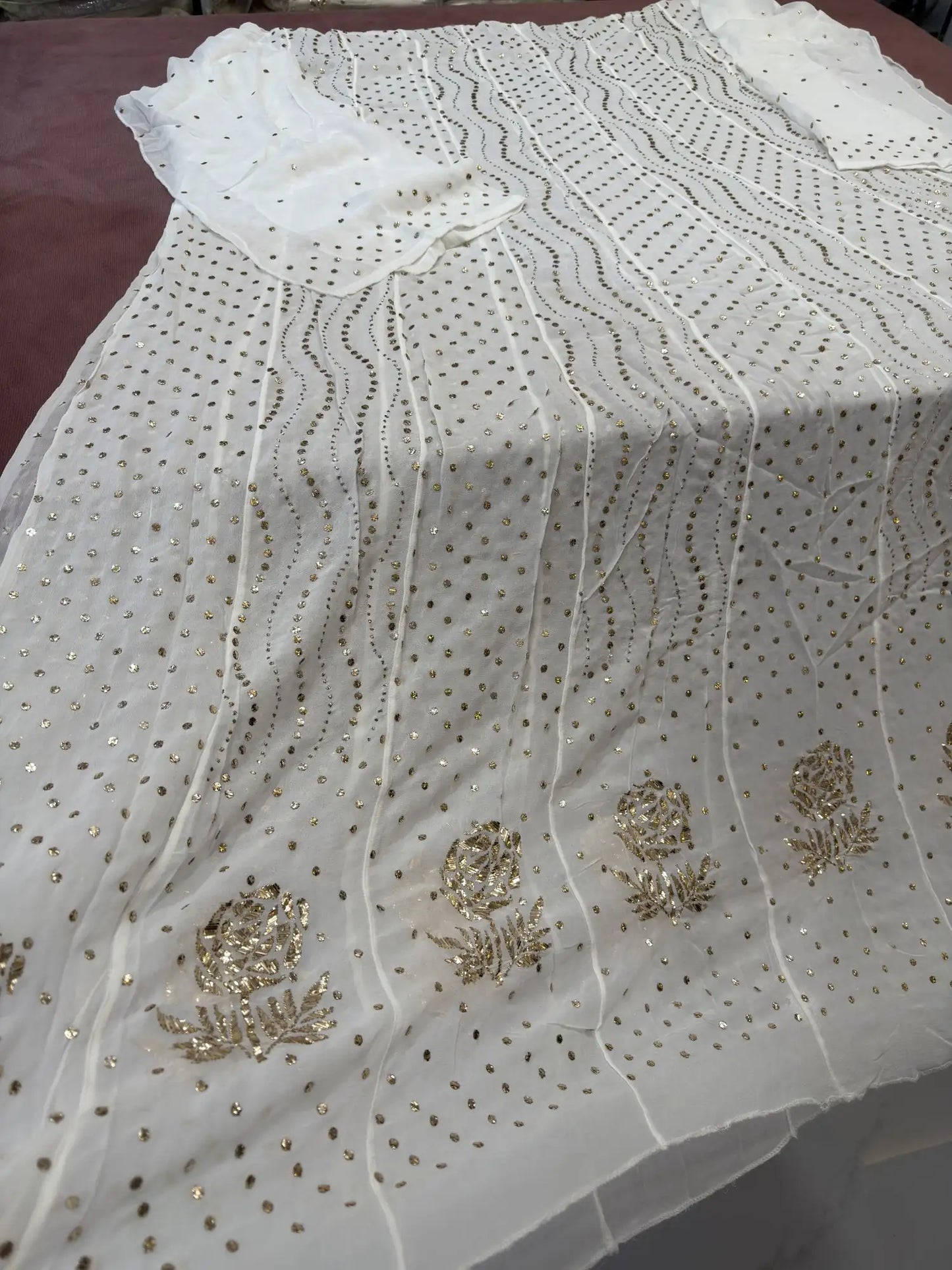 Back view of handcrafted Lucknowi dress with gold-toned Mukaish work