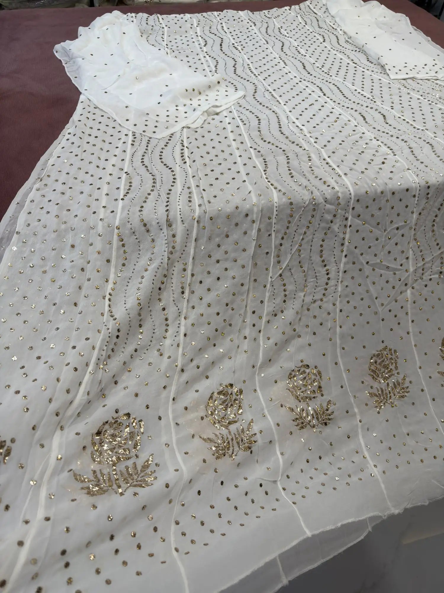 Back view of handcrafted Lucknowi dress with gold-toned Mukaish work
