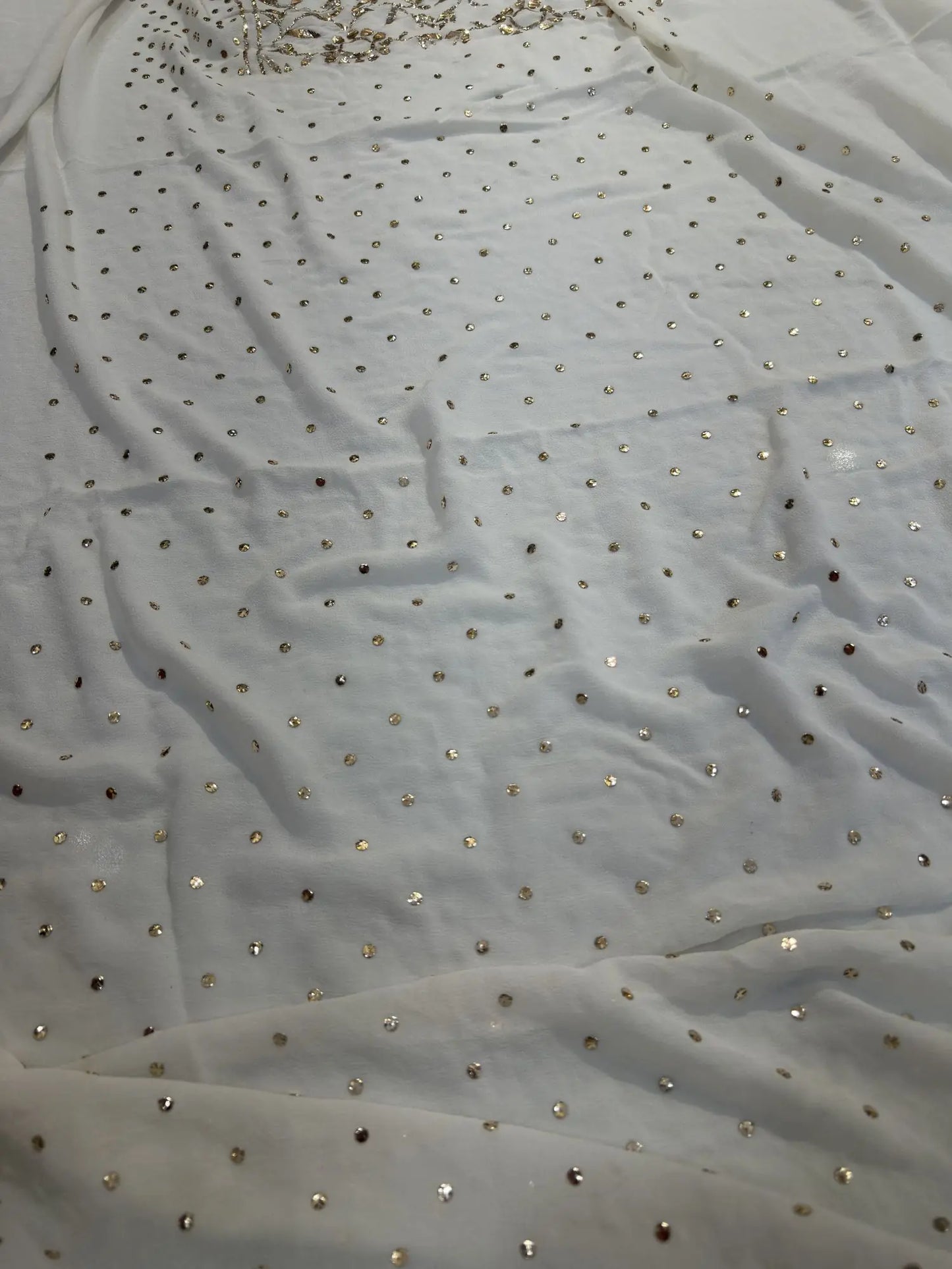 View of an off white Lucknowi Kurta Set with all-over Mukaish dana work