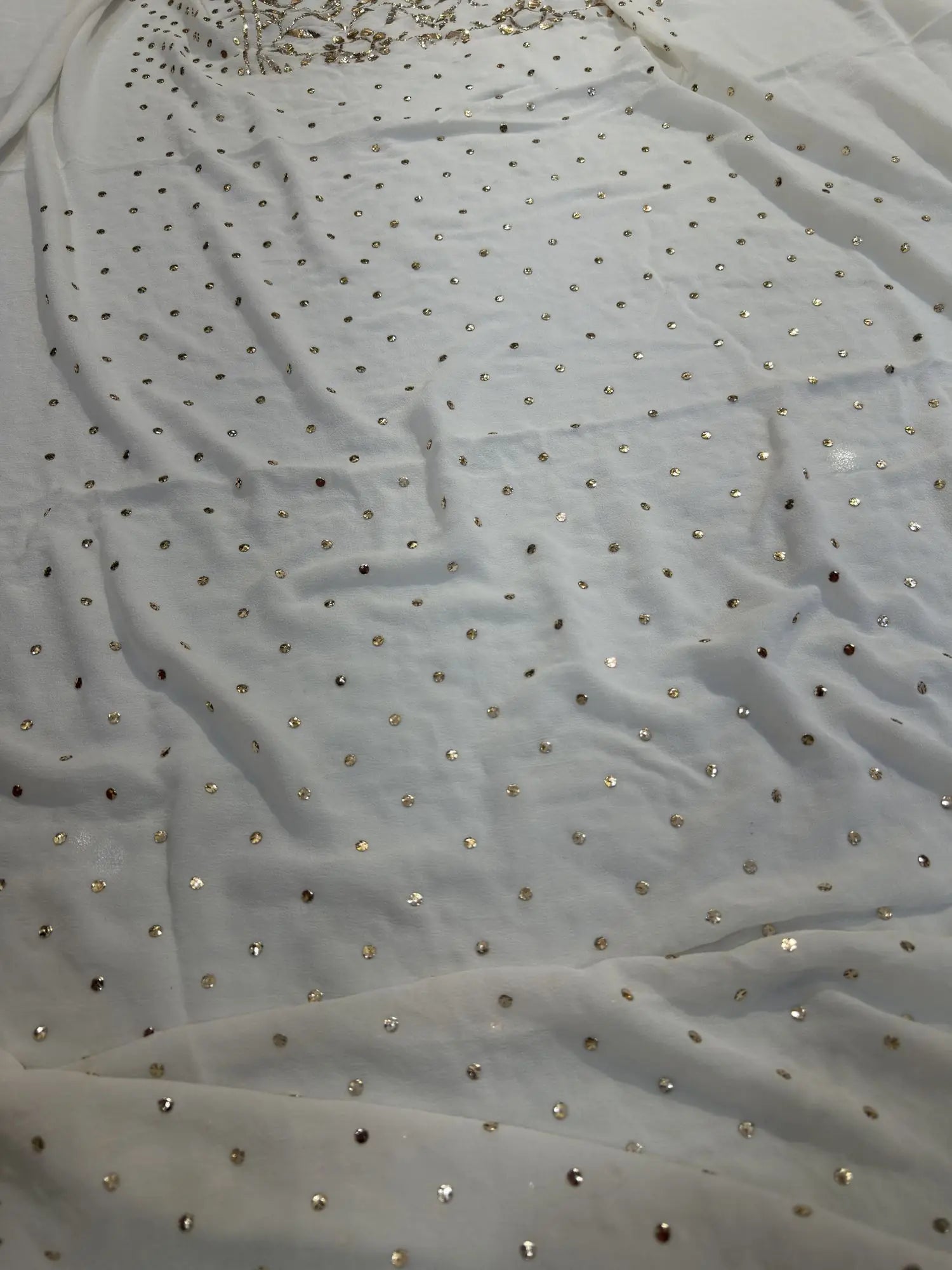 View of an off white Lucknowi Kurta Set with all-over Mukaish dana work