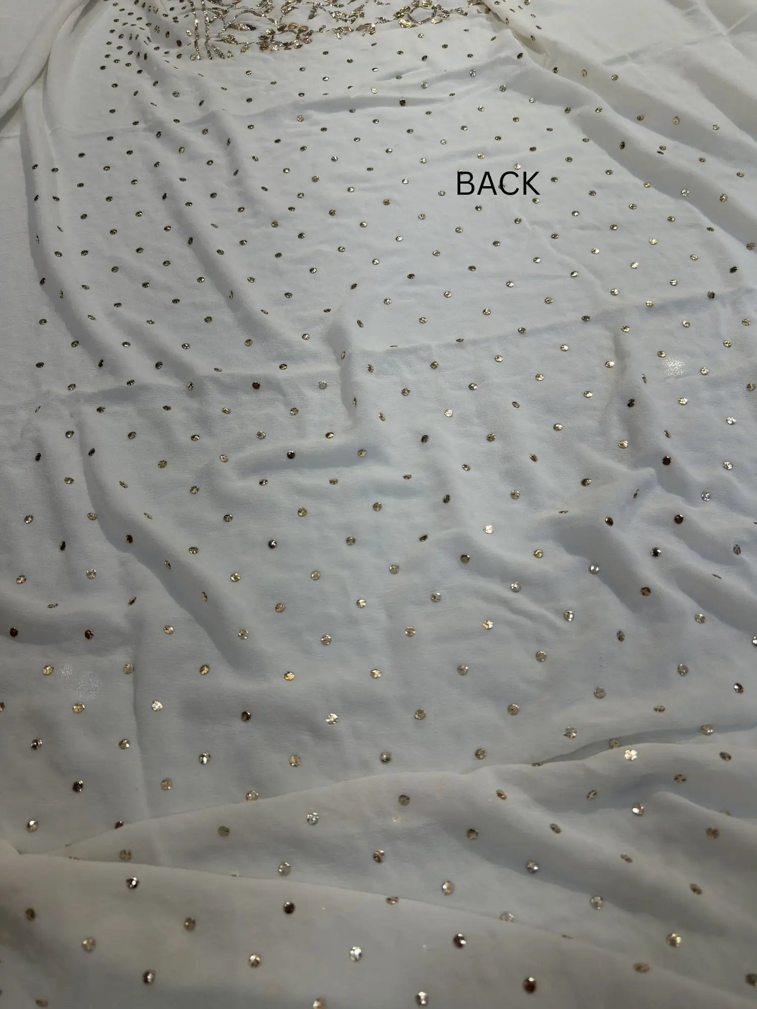 Back view of a White Lucknowi Kurta Set with handcrafted Mukaish dana work