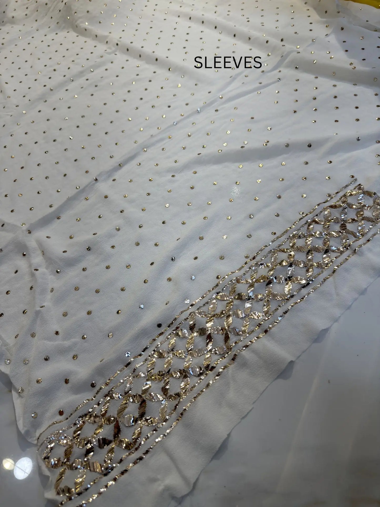 Sleeve detail featuring handcrafted Mukaish work on a Pure Georgette Lucknowi Kurta Set