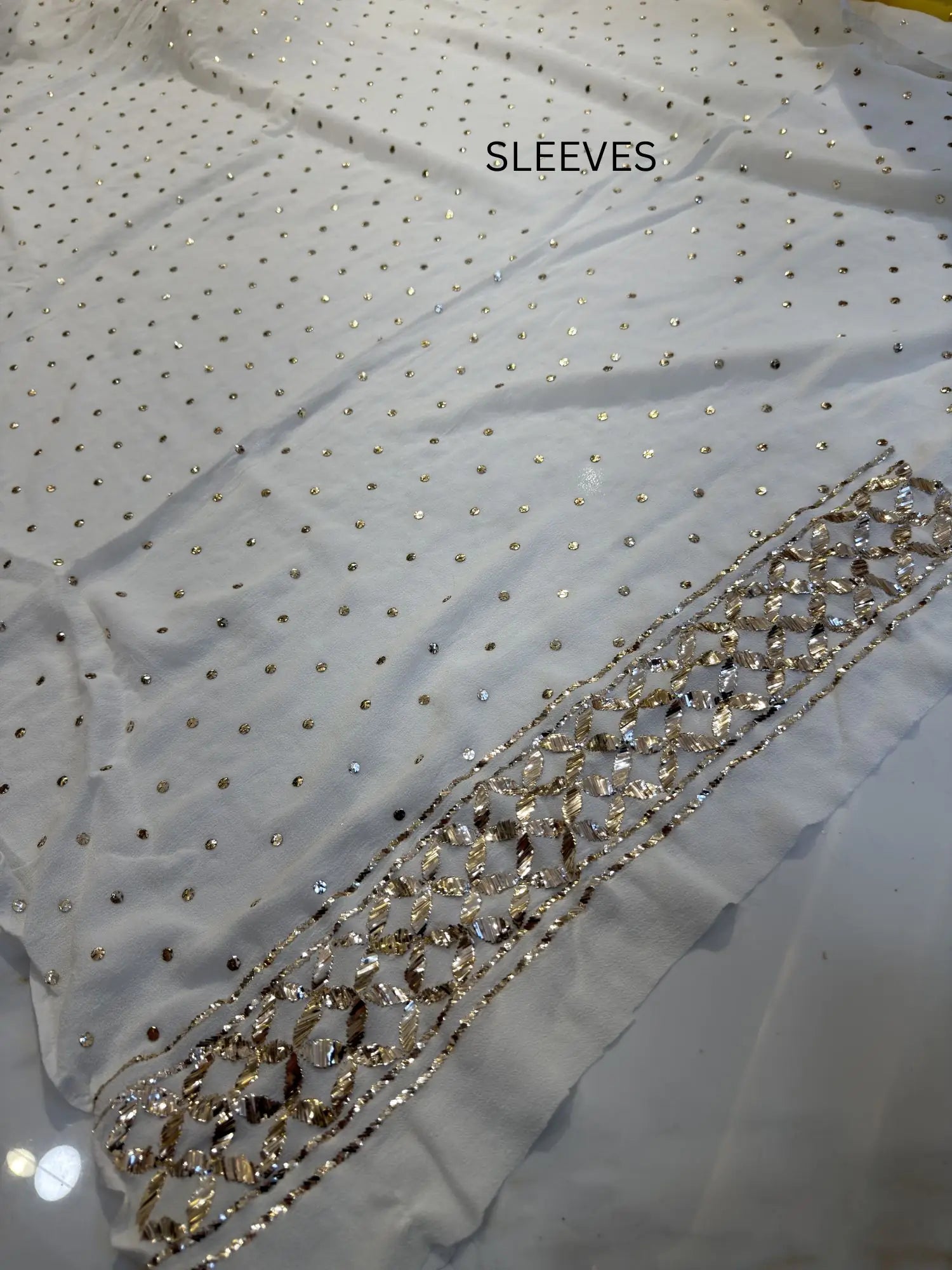 Sleeve detail featuring handcrafted Mukaish work on a Pure Georgette Lucknowi Kurta Set