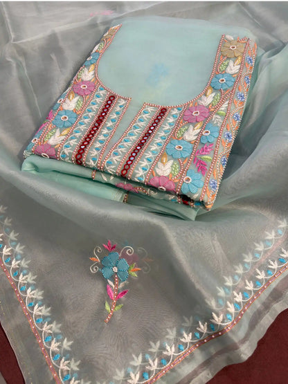 Pastel sea green Pure Organza straight suit with multicolour floral Parsi Shadow embroidery.