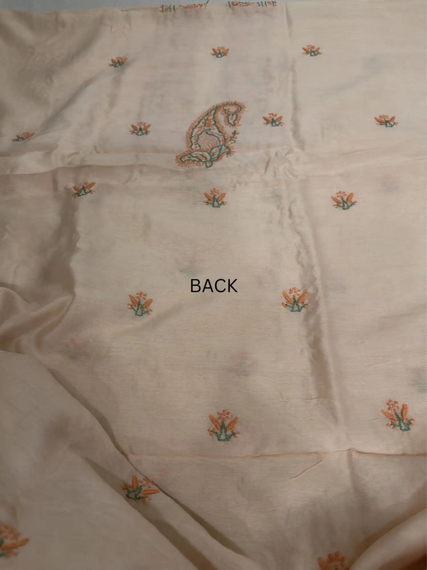 Delicate Lucknowi Chikankari back embroidery across Peach Blush Chanderi Silk unstitched kurta fabric with handcrafted detailing.