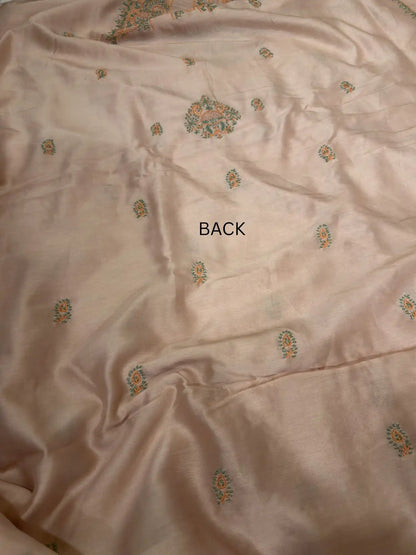Delicate handcrafted Lucknowi Chikankari back embroidery across Peach Chanderi Silk unstitched kurta fabric.