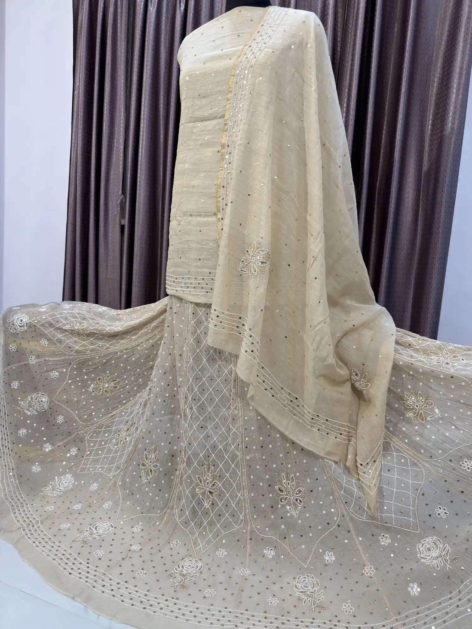 Left view of Petal Floral Lucknowi Chikankari Lehenga featuring intricate floral motifs.