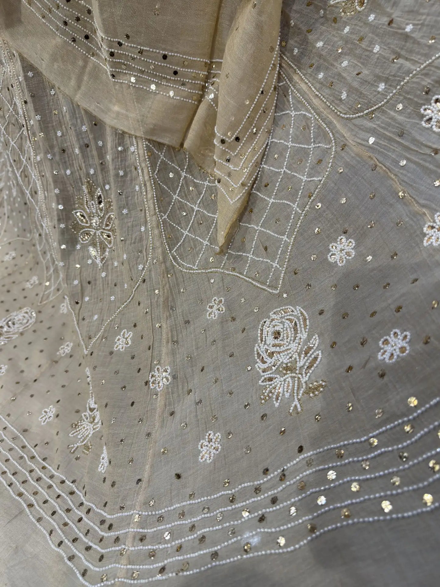Petal floral embroidery on the Lucknowi Chikankari Lehenga.