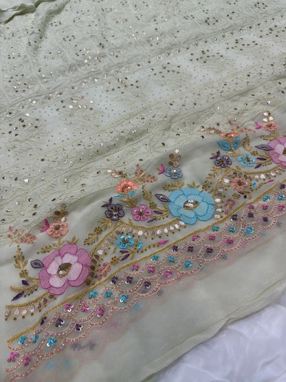 Pista Green suit front detail with multicolour Chikankari floral embroidery and Parsi Shadow Zardozi work