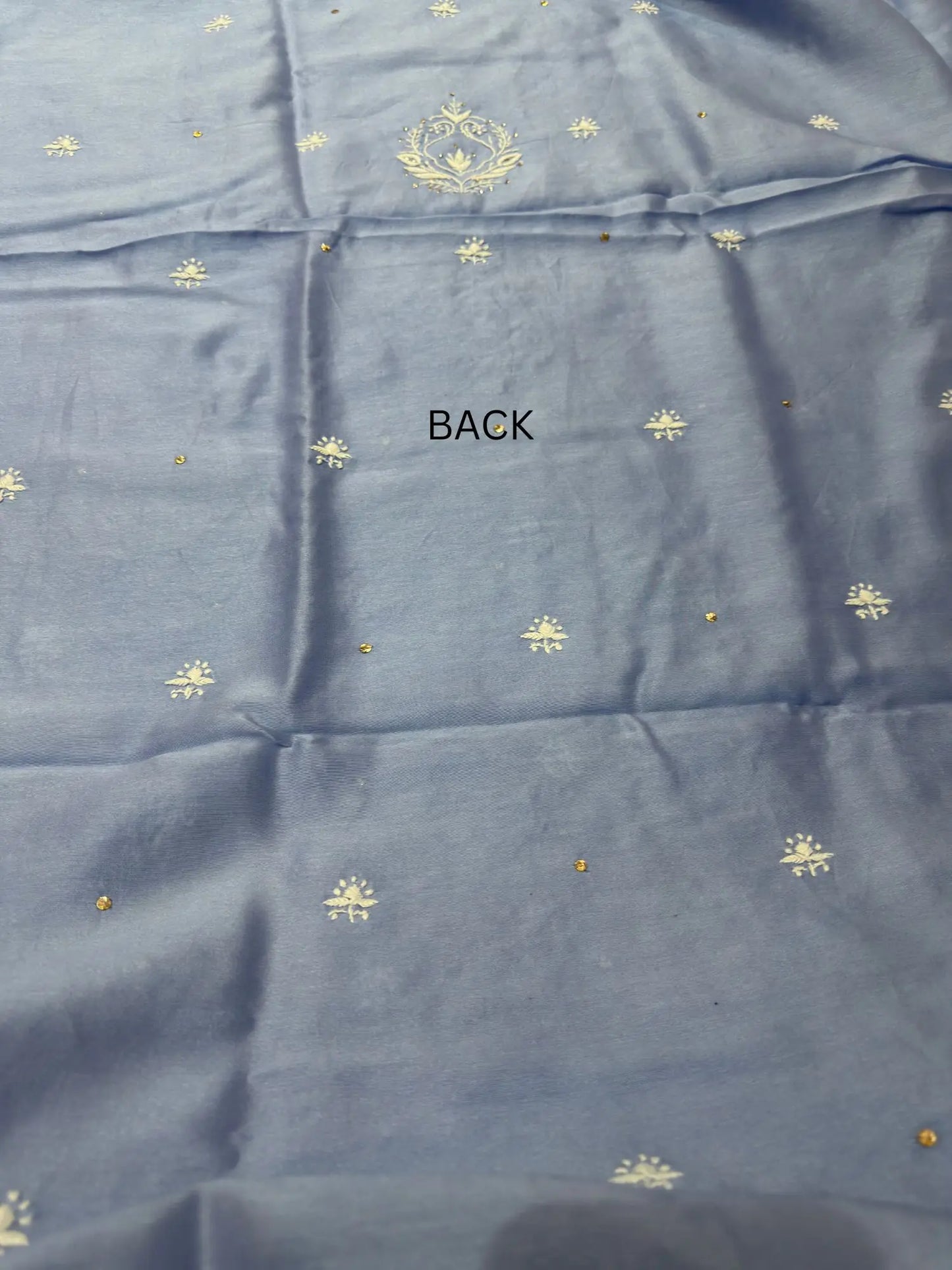 Back view of Powder Blue linen Chikankari unstitched kurta fabric.