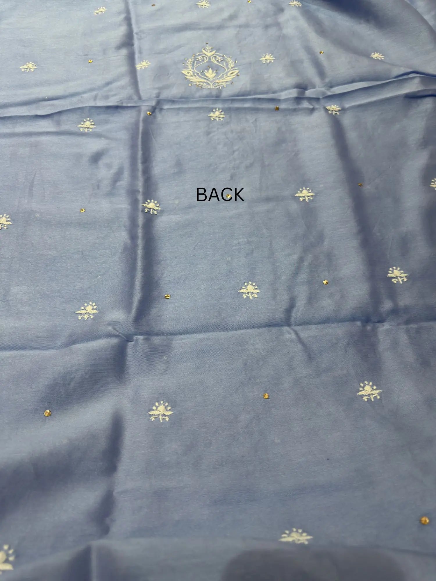 Back view of Powder Blue linen Chikankari unstitched kurta fabric.