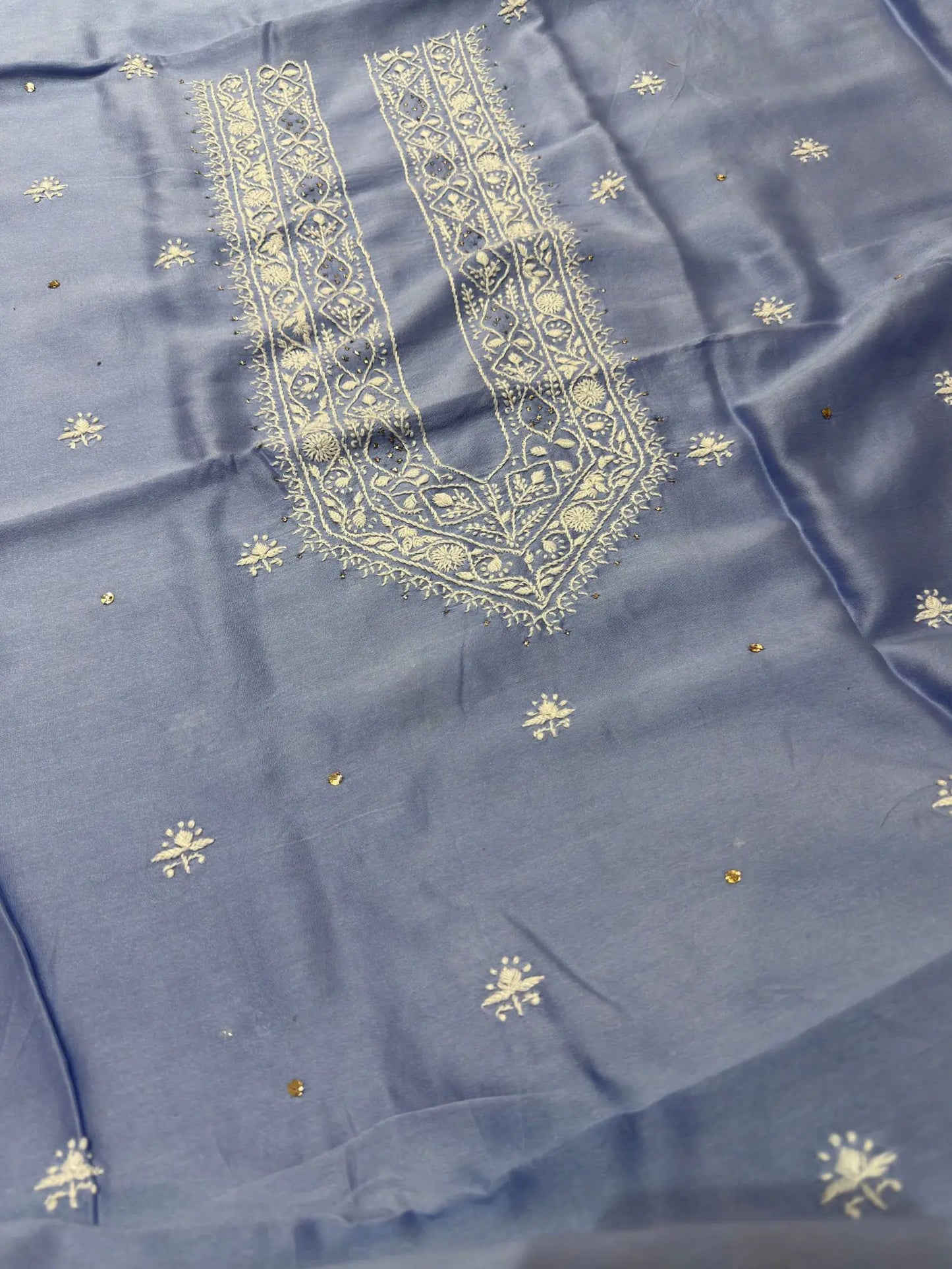 Powder Blue linen Lucknowi Chikankari unstitched kurta fabric with fine white embroidery.
