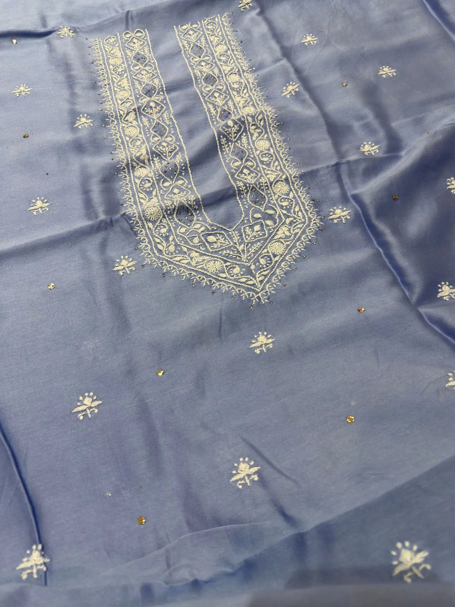 Powder Blue linen Lucknowi Chikankari unstitched kurta fabric with fine white embroidery.
