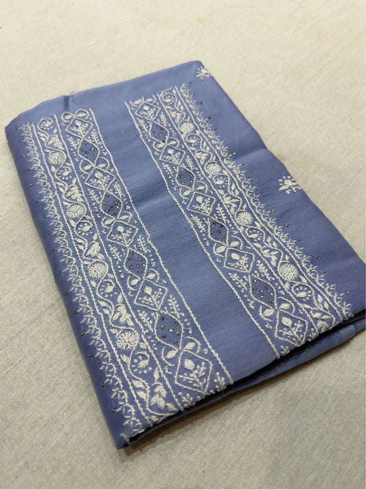Powder Blue linen Lucknowi Chikankari unstitched kurta fabric with fine white embroidery.