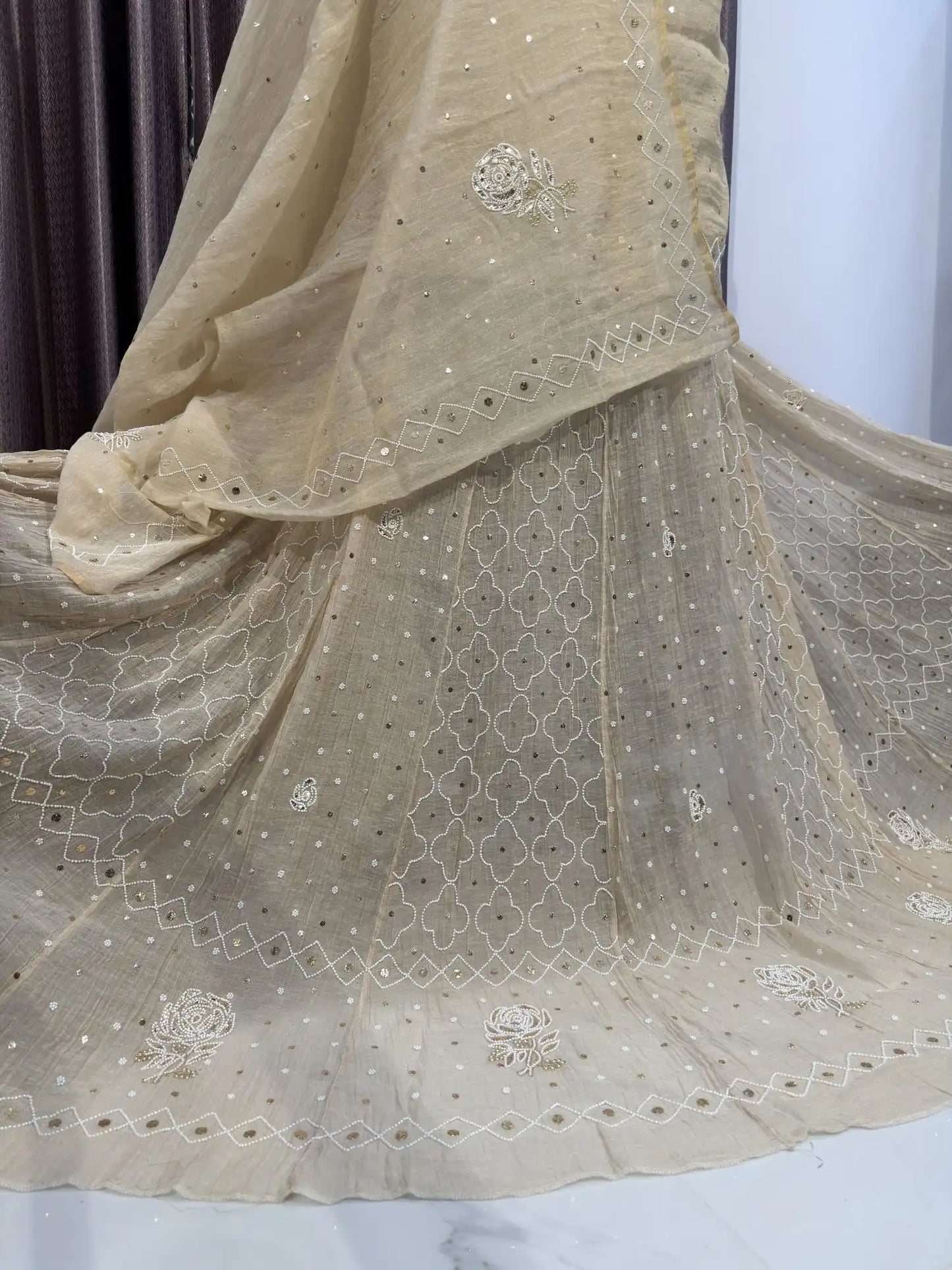 Close-up of handcrafted Mukaish and pearl work on the Pure Tissue Lucknowi Lehenga ghera