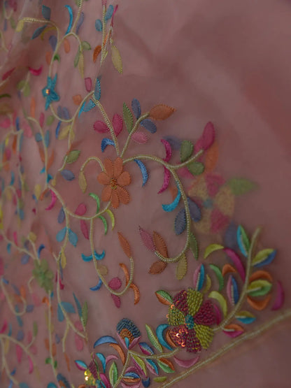 Close-up of rose gold Pure Organza Silk suit with multicolour floral embroidery and pearl detailing