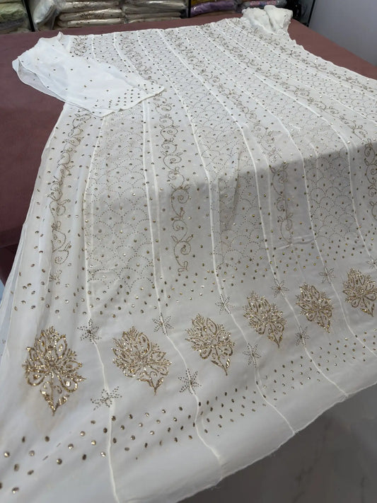 Close-up of vine-inspired gold-toned Mukaish and Badla embroidery on Lucknowi dress