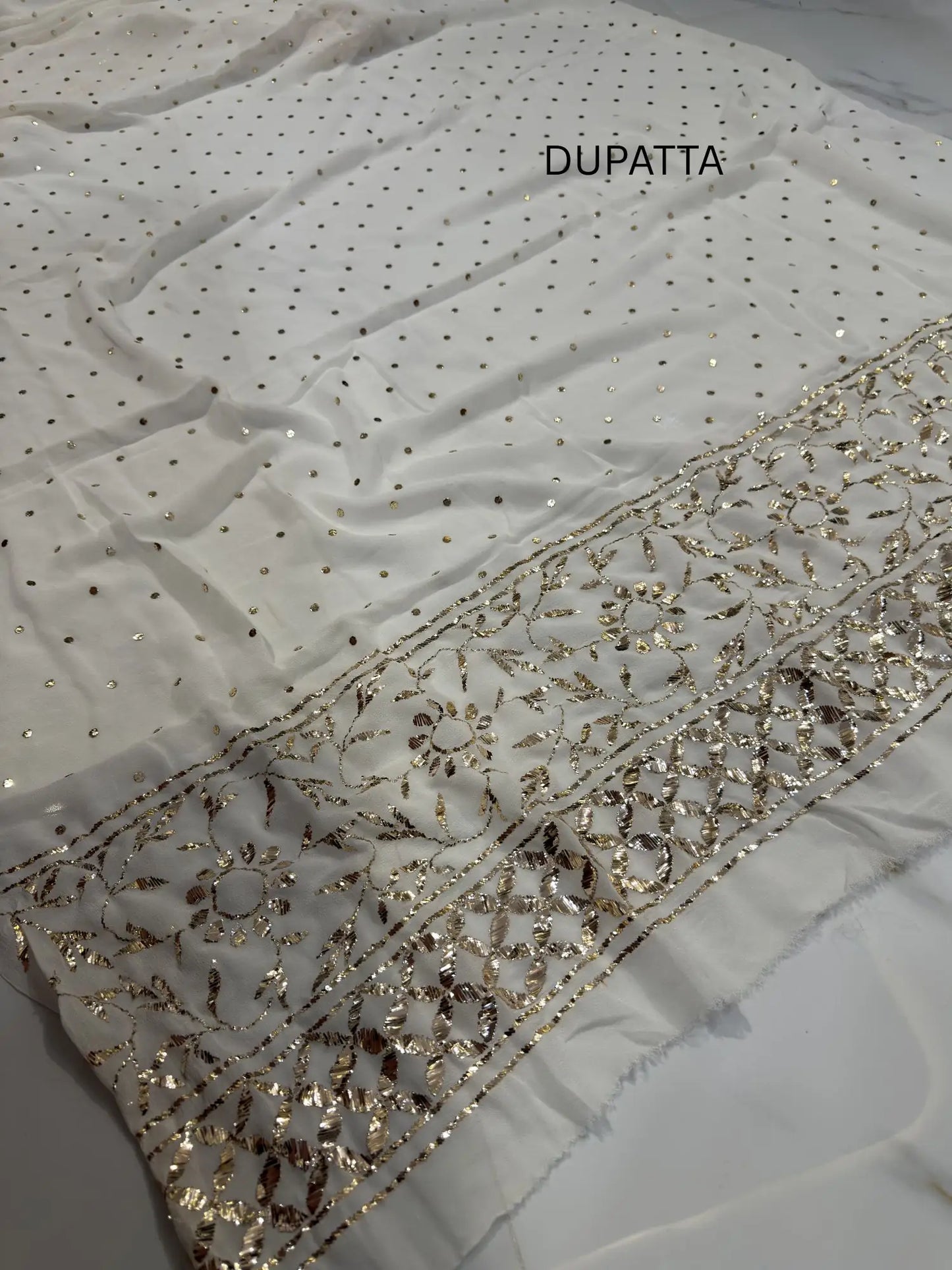 White Pure Georgette dupatta with handcrafted Mukaish work and floral embroidered border